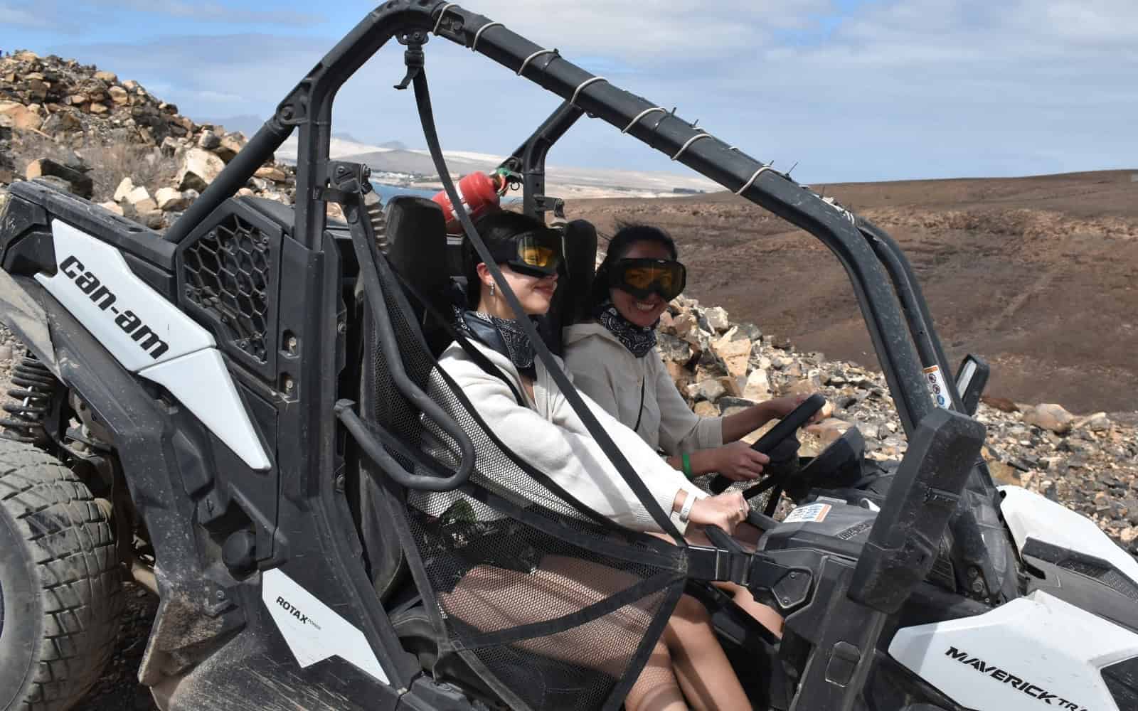 Two guests in a buggy on a volcanic trail in Fuerteventura