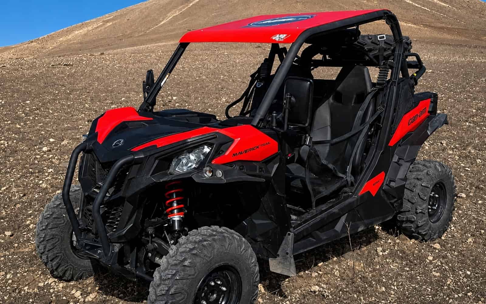 Red buggy in the volcanic landscape of Lanzarote