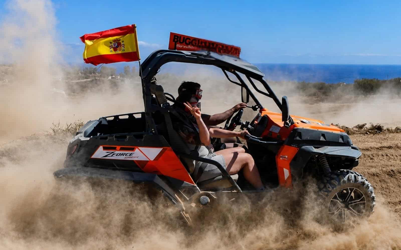 Buggy driving along a dusty track in Tenerife