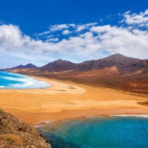 Cofete beach with turquoise water and mountains in Fuerteventura