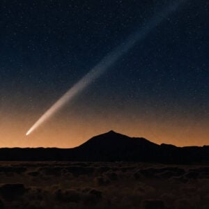 Bright night sky above a mountain silhouette in La Palma