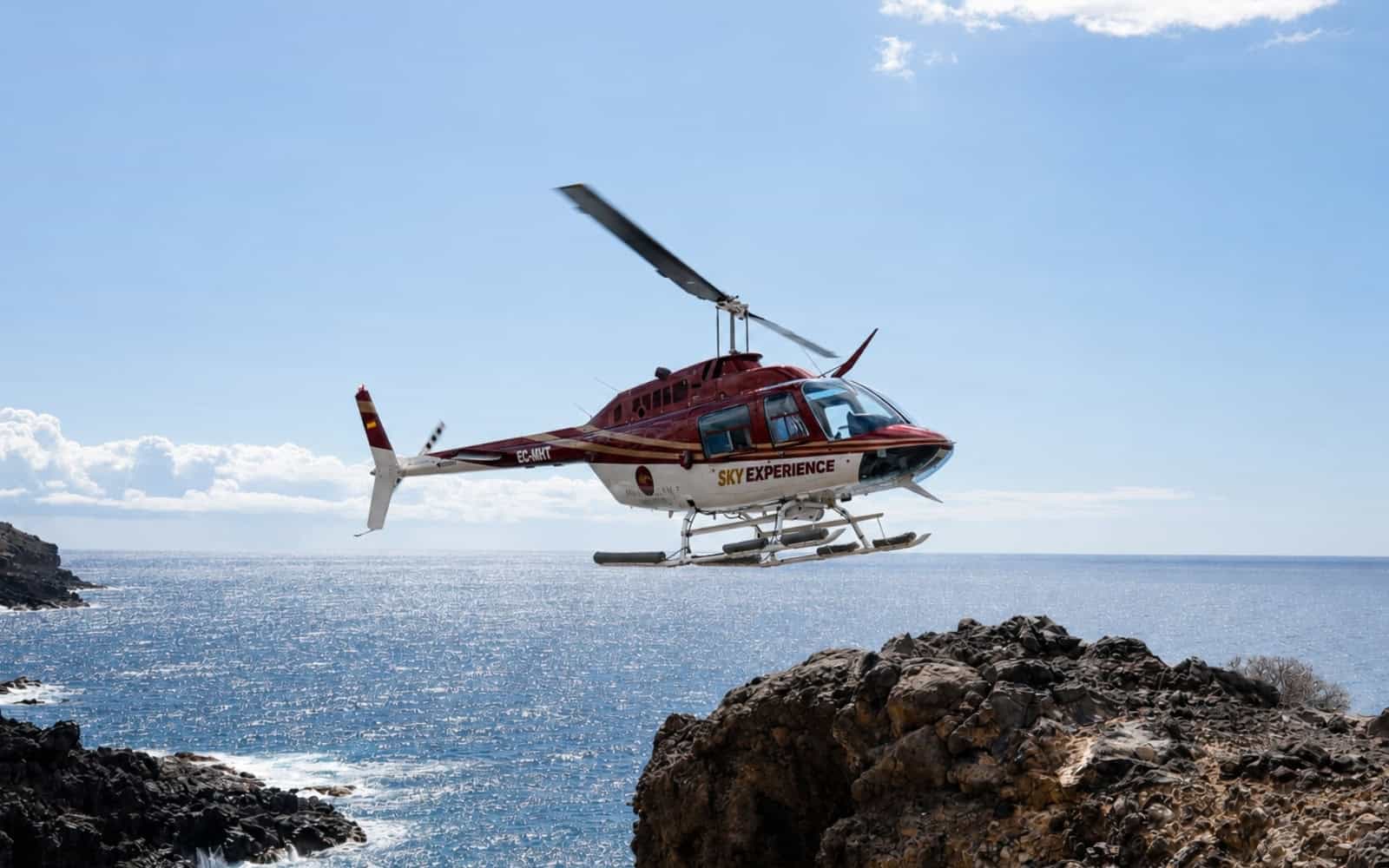 Helicopter flying along the coast of the Canary Islands