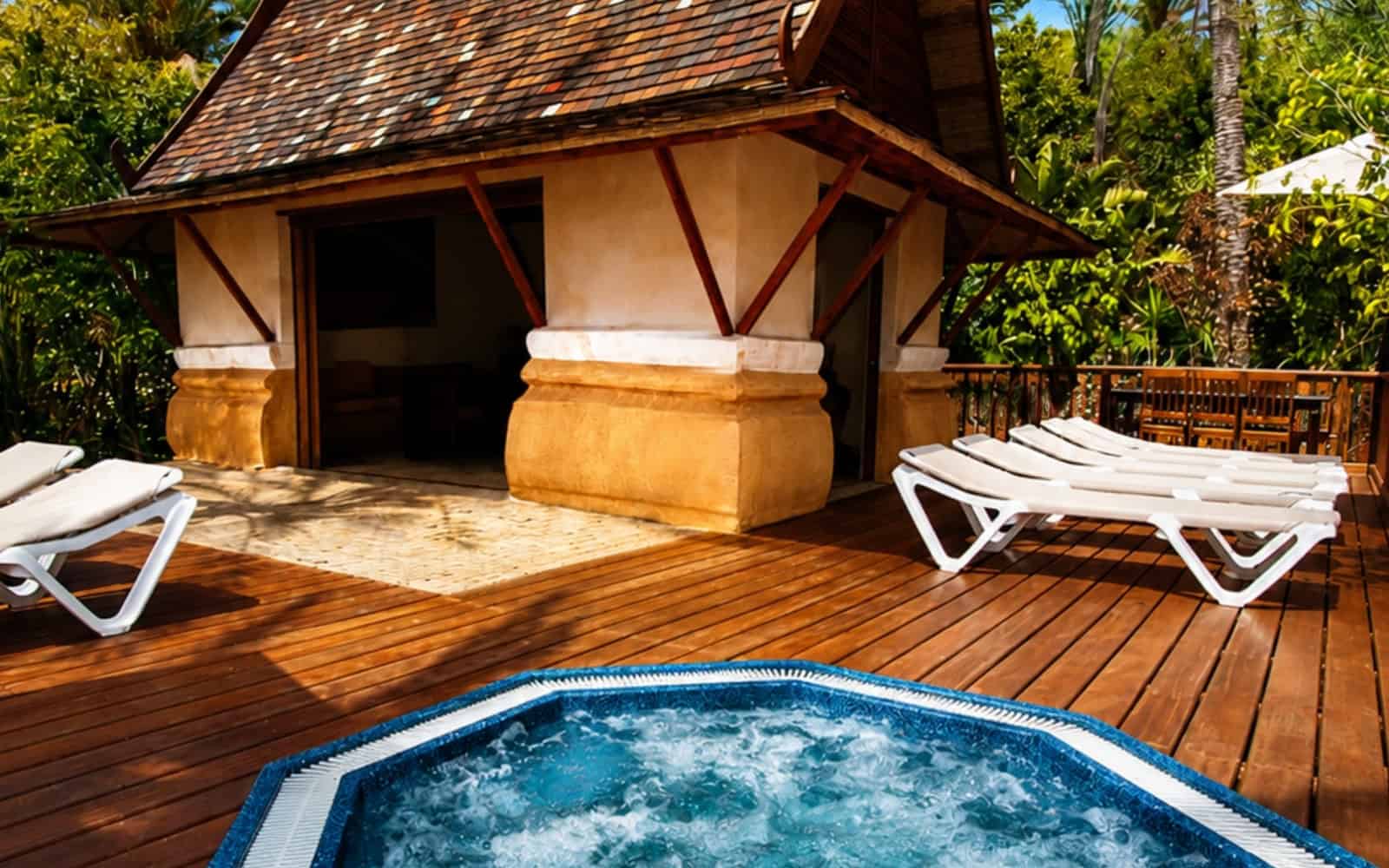 Private villa terrace with jacuzzi and sun loungers at Siam Park in Tenerife
