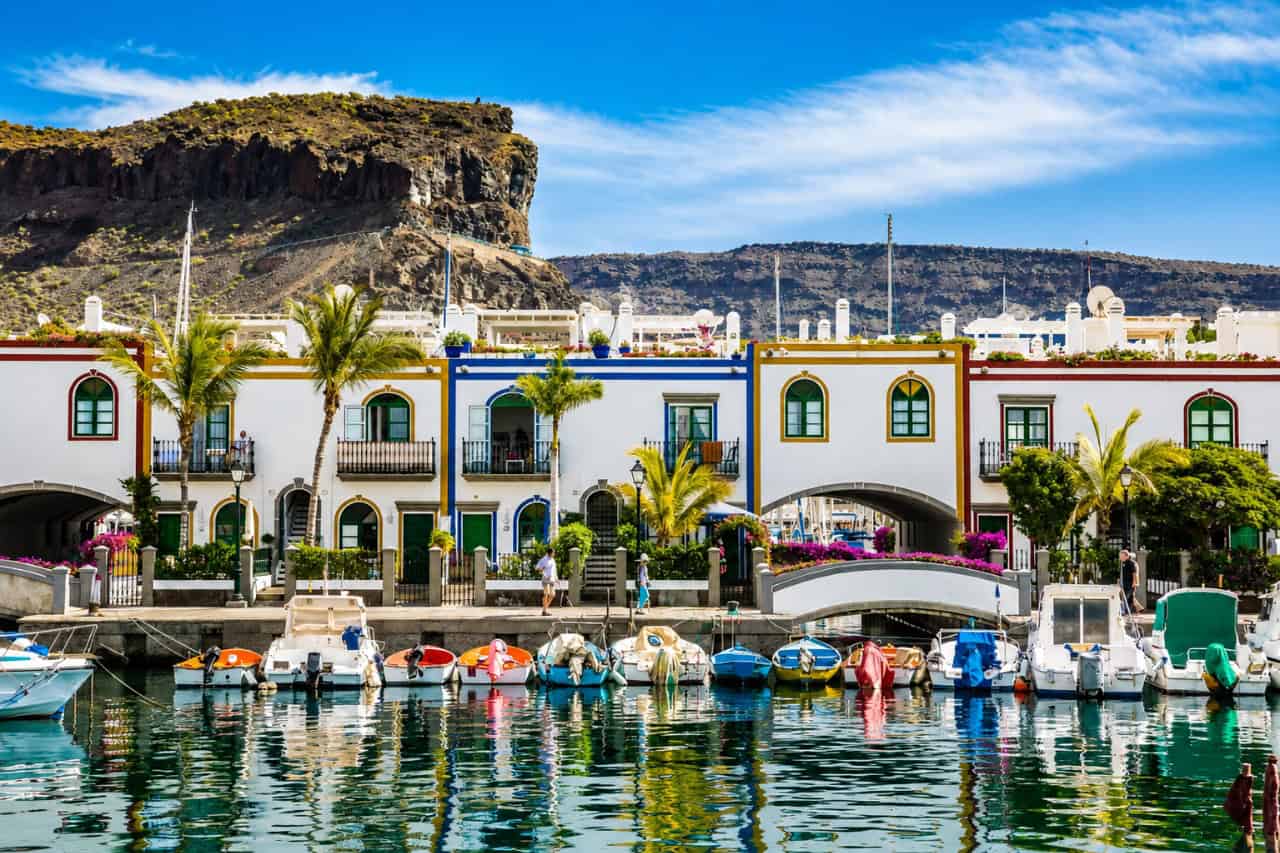 Colourful waterfront houses and canals in Puerto de Mogan