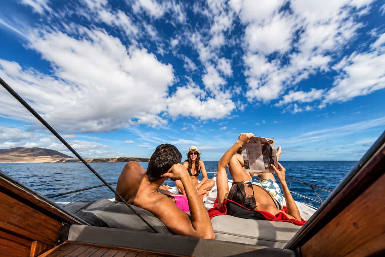 Guests relaxing on deck during the Chill Out Cruise in Lanzarote