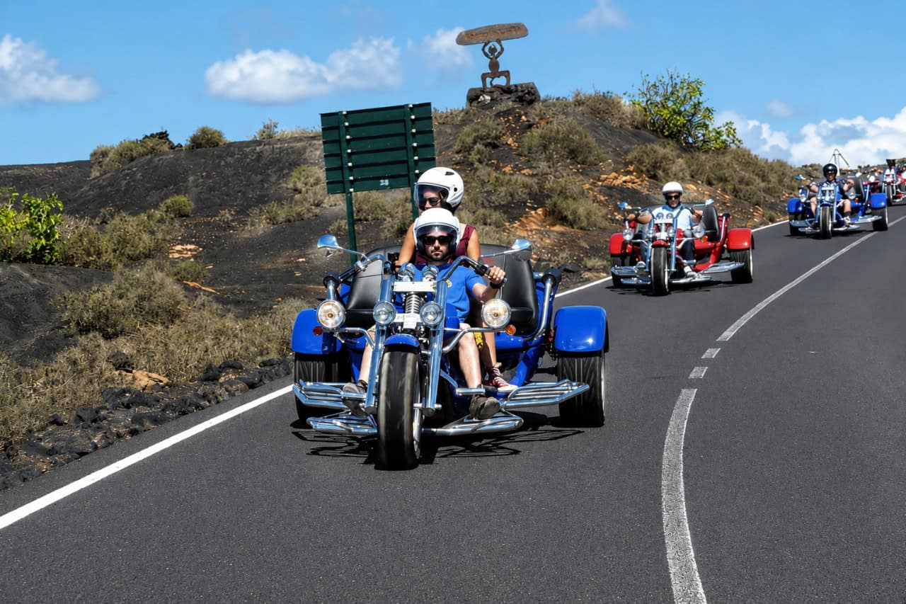 Guided trike tour riding through the volcanic landscape of Lanzarote