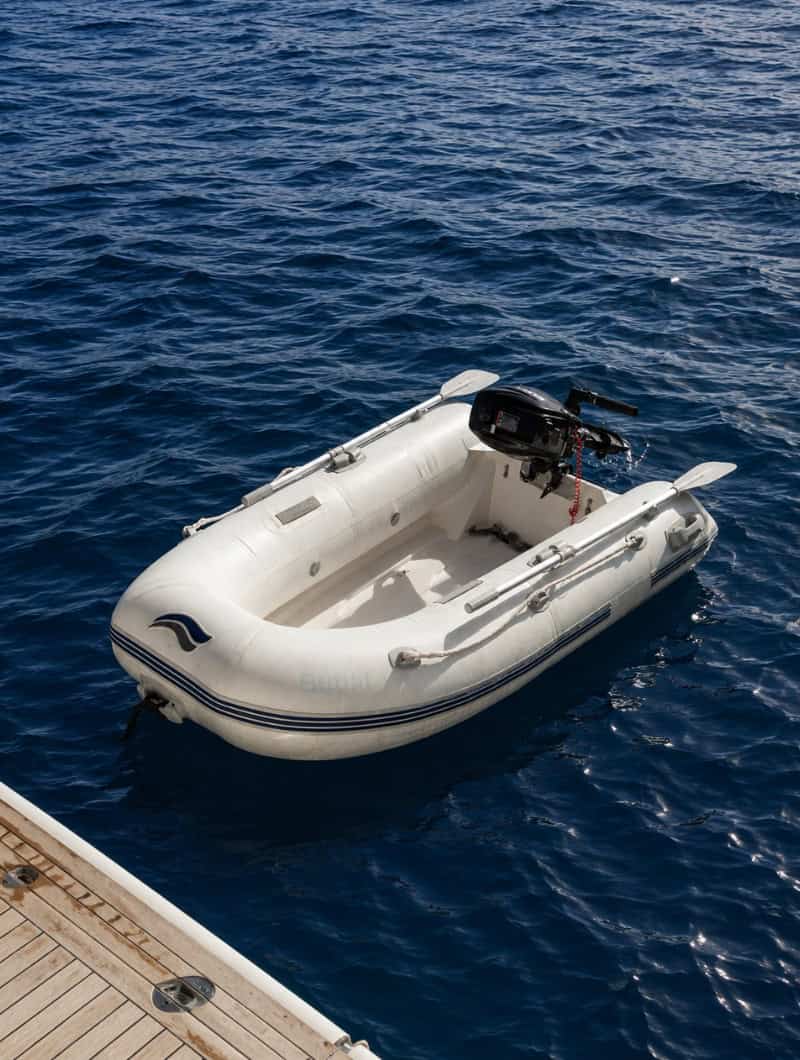 A private tender boat beside the yacht on a Los Gigantes private boat trip in Tenerife.