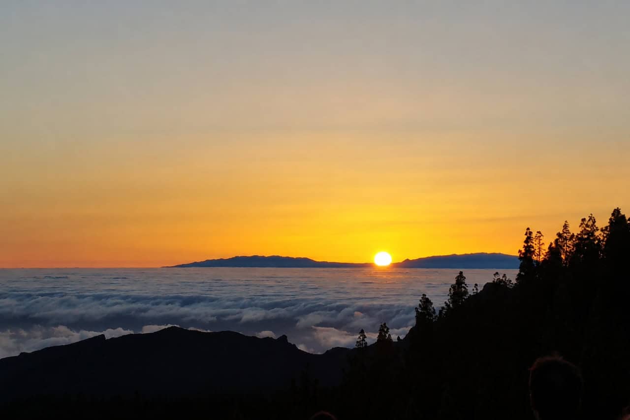 Golden sunset above the clouds before the stargazing session