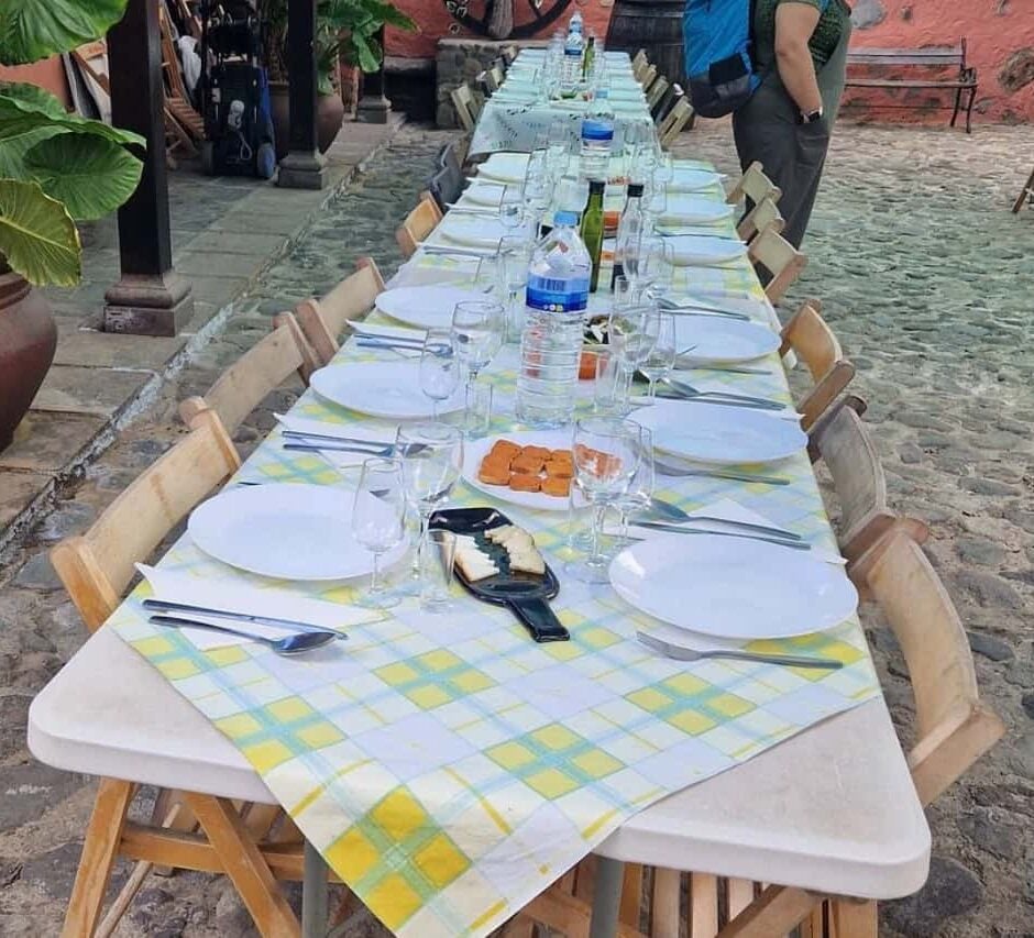 Long outdoor dining table arranged for guests before the Tenerife Stars Excursion continues to Teide for stargazing.