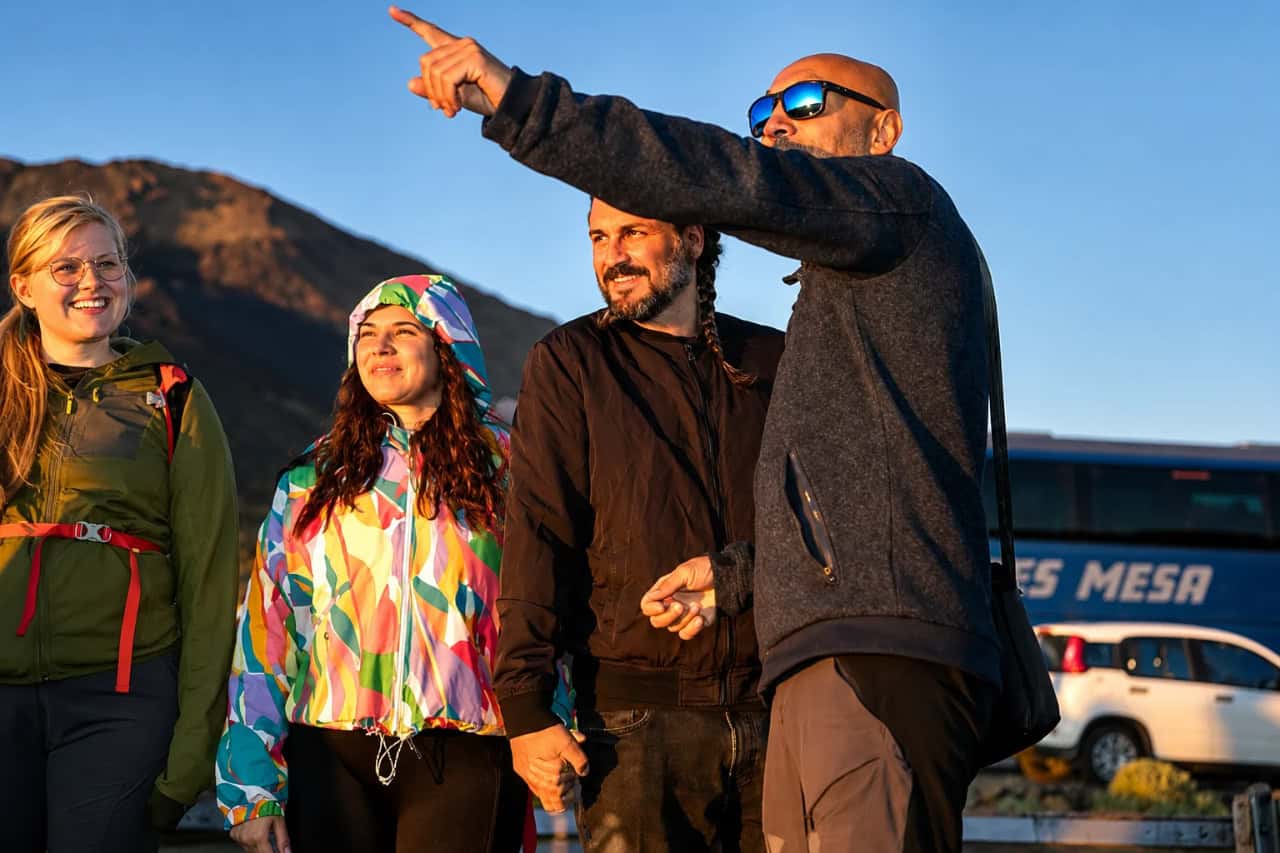 Tenerife Stars Excursion guide pointing out sights to guests during a Teide stargazing tour in Tenerife.