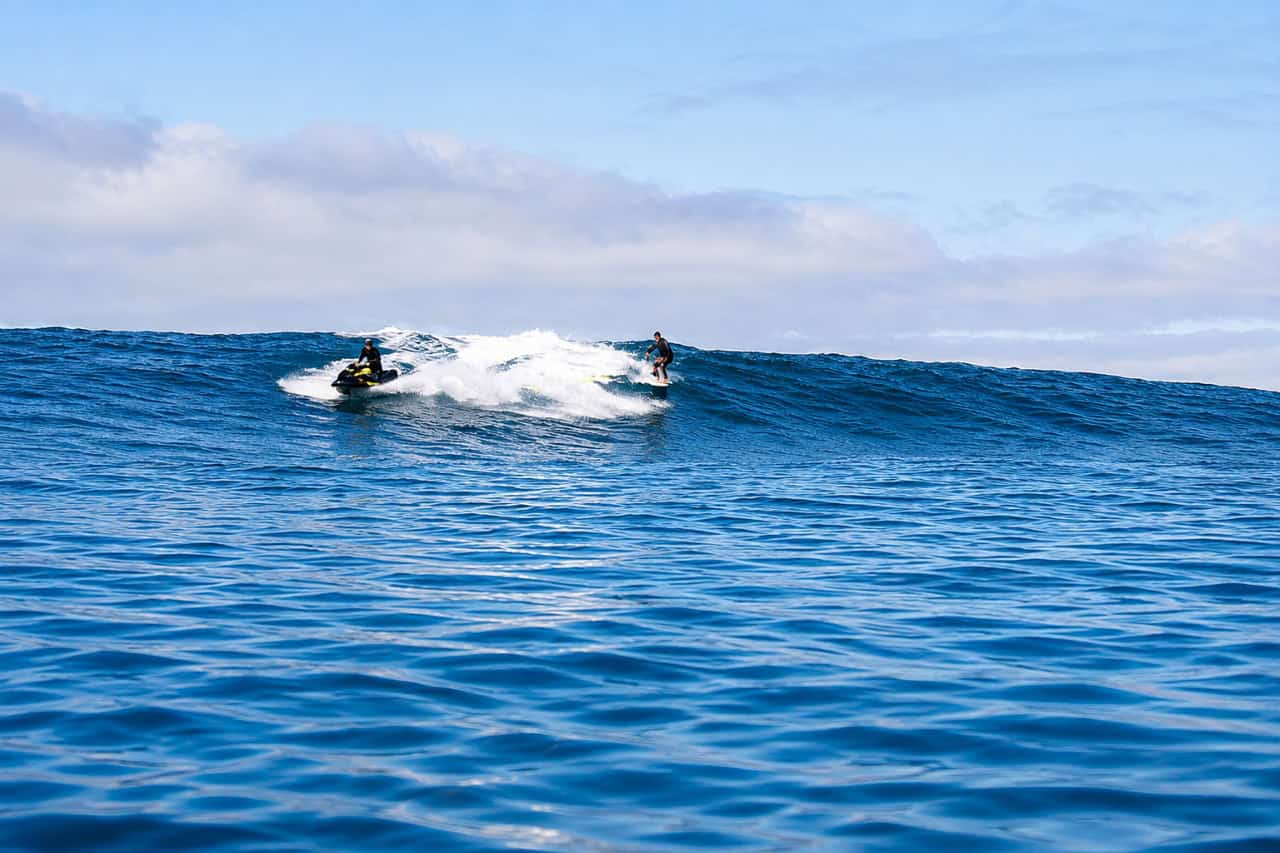 Tow-in surfing with jet ski assistance at Famara Lanzarote