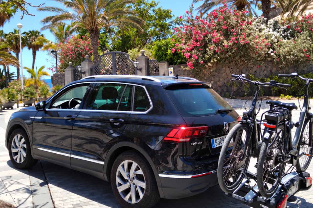 Rental bikes secured on a car bike rack ready for delivery in Tenerife