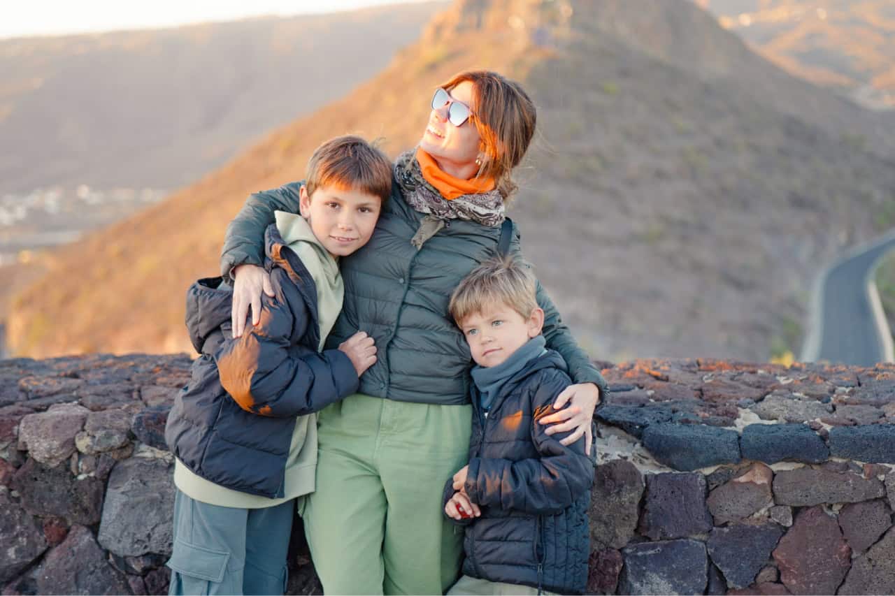 Family enjoying a scenic stop in the mountains during the buggy tour