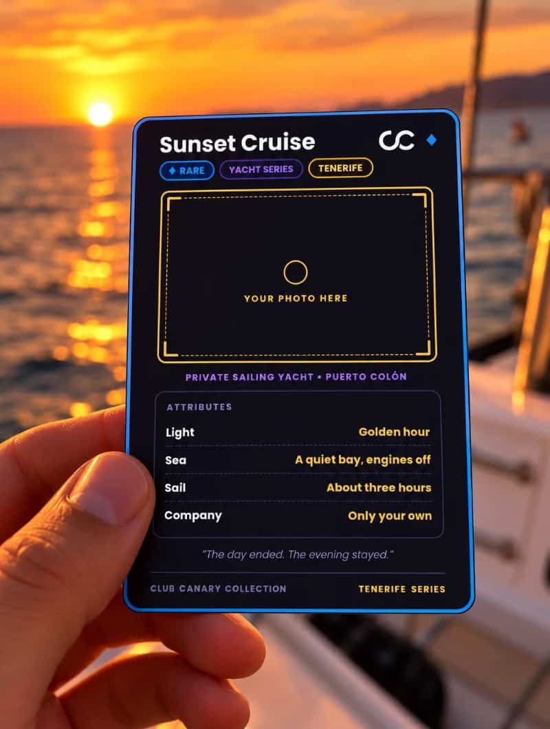 Club Canary Sunset Cruise collectible card held up against a Tenerife sunset, with an empty frame where your own photo goes