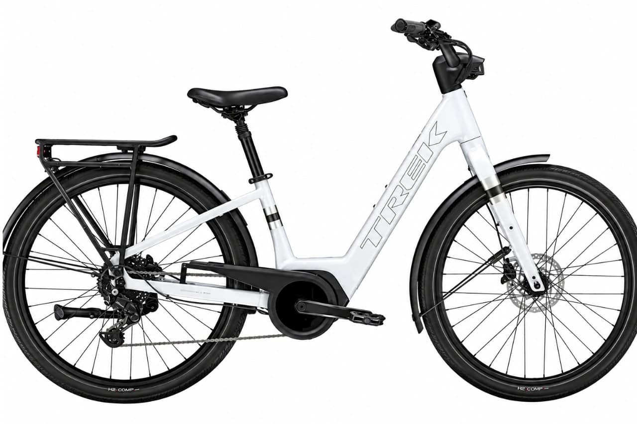 White Trek step-through electric city bike with rear rack for rent in Tenerife