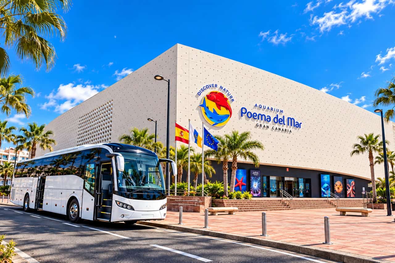White coach parked outside Poema del Mar aquarium in Las Palmas after the drive from south Gran Canaria
