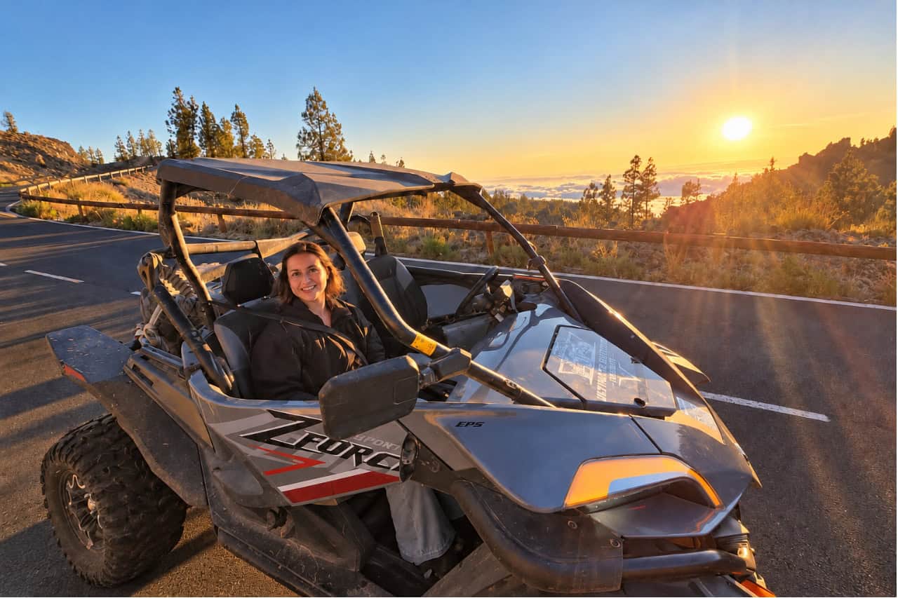 Buggy at a high viewpoint above the clouds at sunset in Tenerife